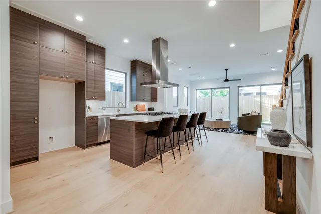 a kitchen with a stove and a sink
