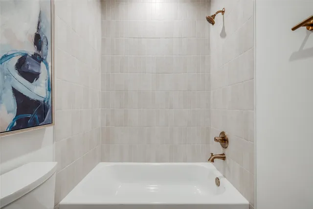 a view of a lobby with furniture and floor to ceiling window