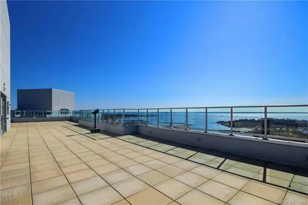 a view of swimming pool with outdoor seating and a terrace