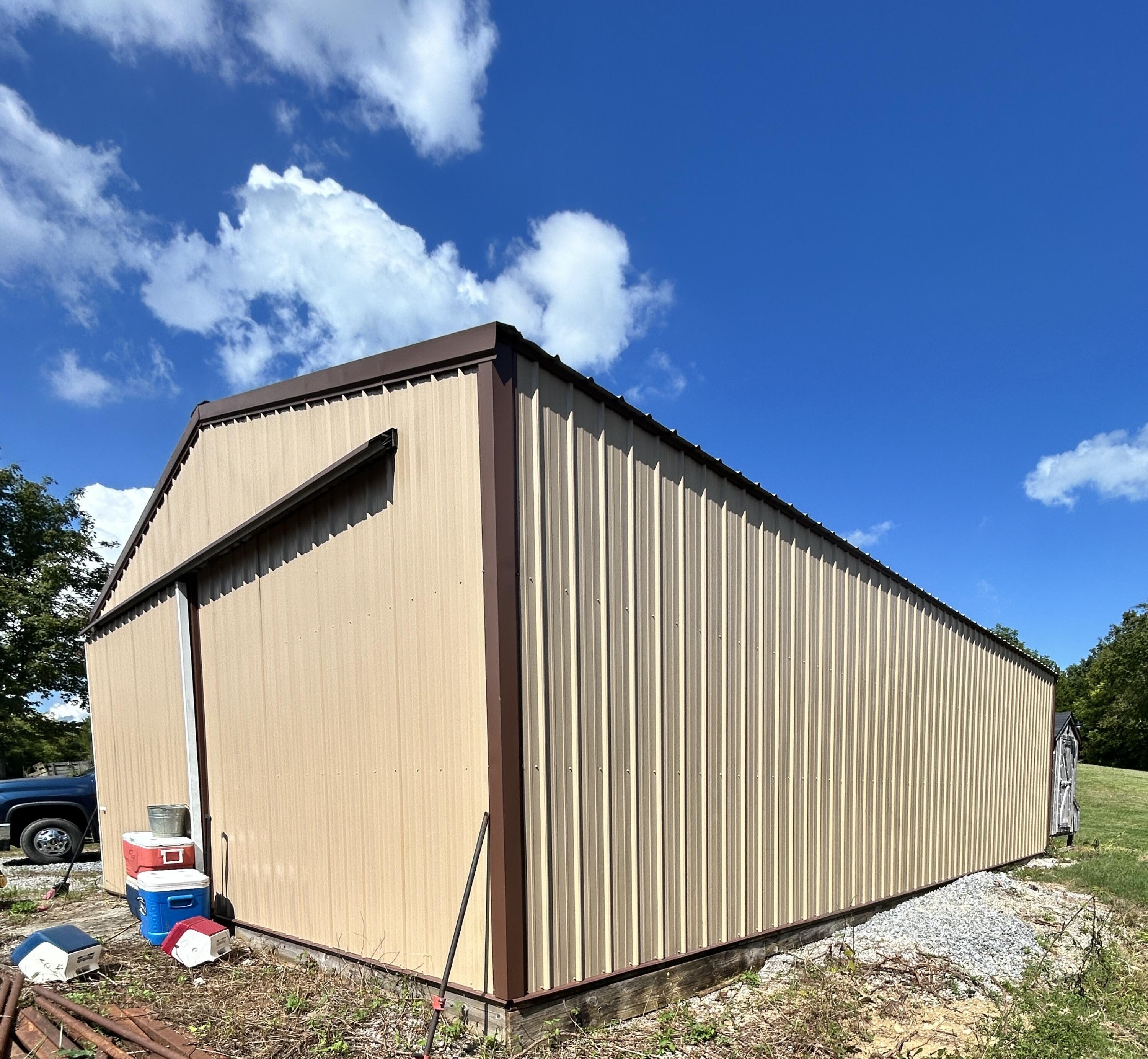 726 Old Brown Road Salvisa, KY 40372 - Photo 69 of 89 Detached Garage waiting for its next mechanic Very nice , Newer structure. Concrete flooring, electric, etc.