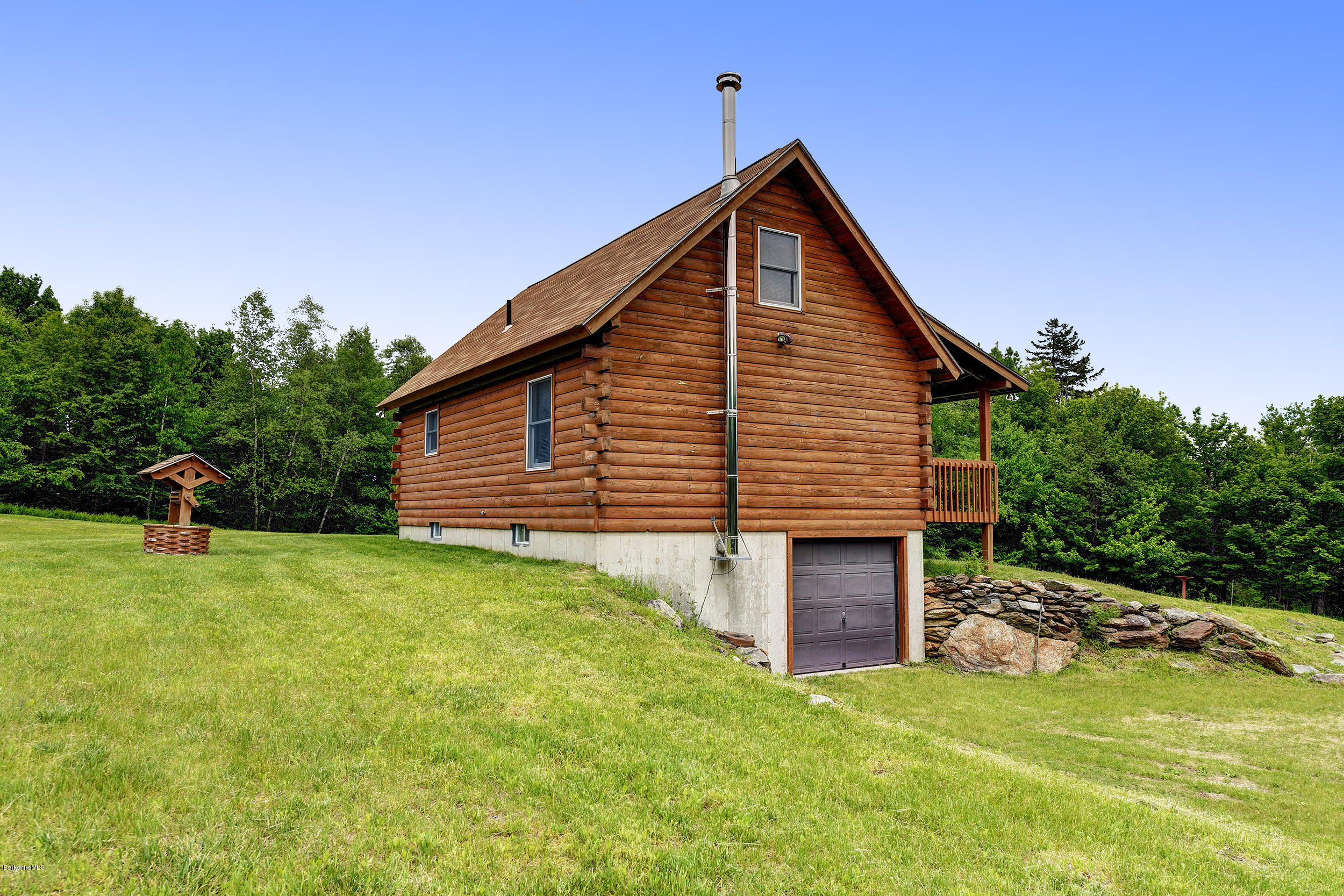 92 Curtin Road Peru, MA 01235 - Photo 3 of 30 a front view of a house with a yard