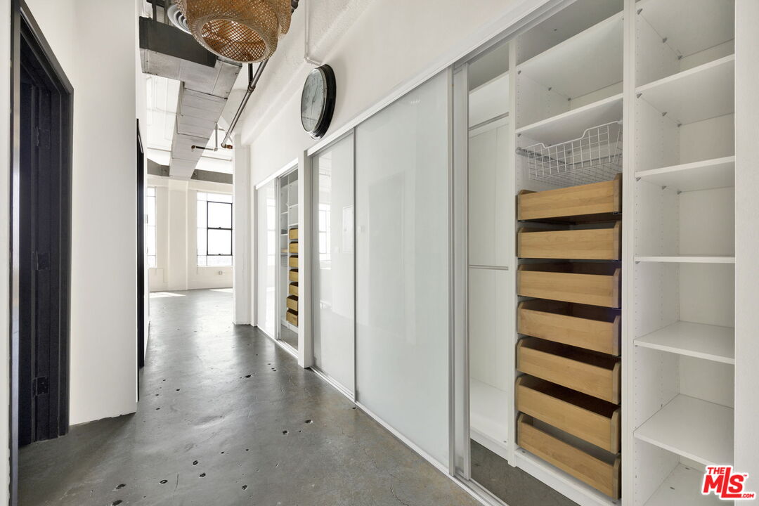 315 East 8th Street, Unit 1102 Los Angeles, CA 90014 - Photo 23 of 34 a view of hallway with stairs