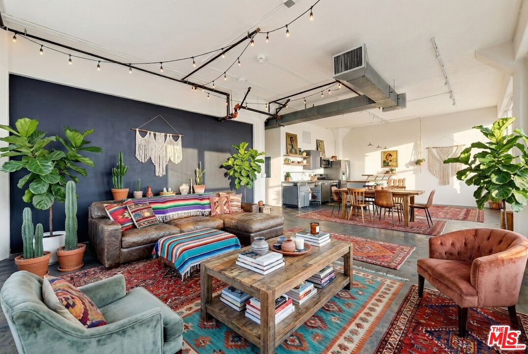 315 East 8th Street, Unit 1102 Los Angeles, CA 90014 - Photo 4 of 34 a outdoor living space with furniture and a fireplace