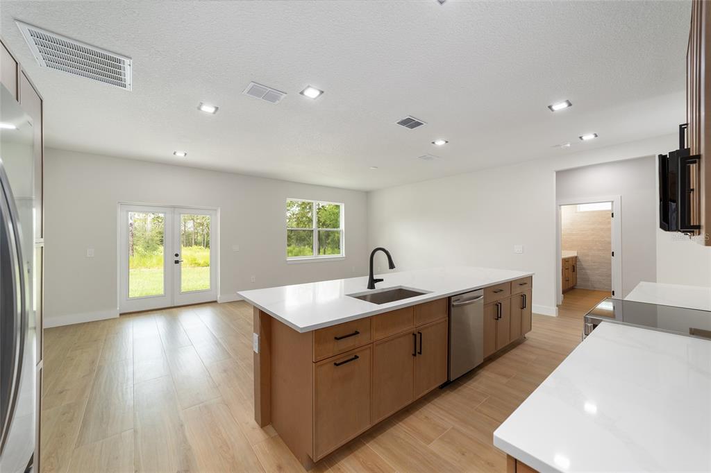 4380 Southwest 159th Court Ocala, FL 34481 - Photo 16 of 44 a spacious bathroom with double vanity and a mirror