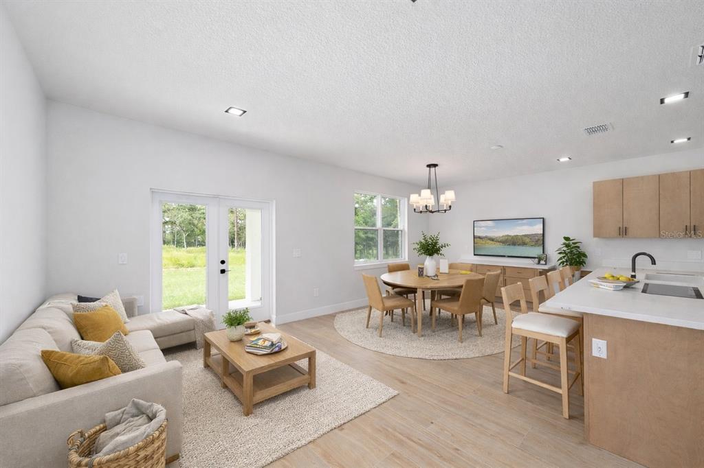 4380 Southwest 159th Court Ocala, FL 34481 - Photo 17 of 44 a living room with furniture and a large window