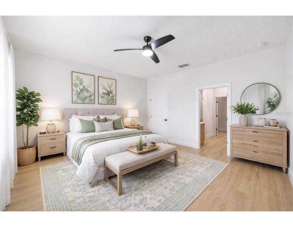 4380 Southwest 159th Court Ocala, FL 34481 - Photo 20 of 44 a bedroom with a bed and a dresser