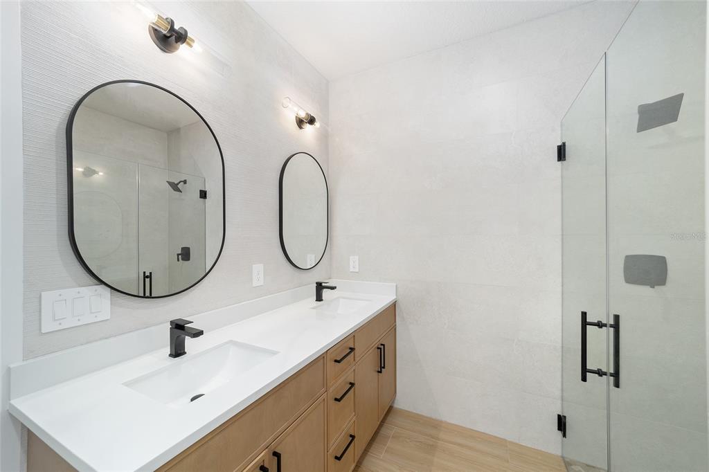 4380 Southwest 159th Court Ocala, FL 34481 - Photo 22 of 44 a bathroom with a sink and mirror