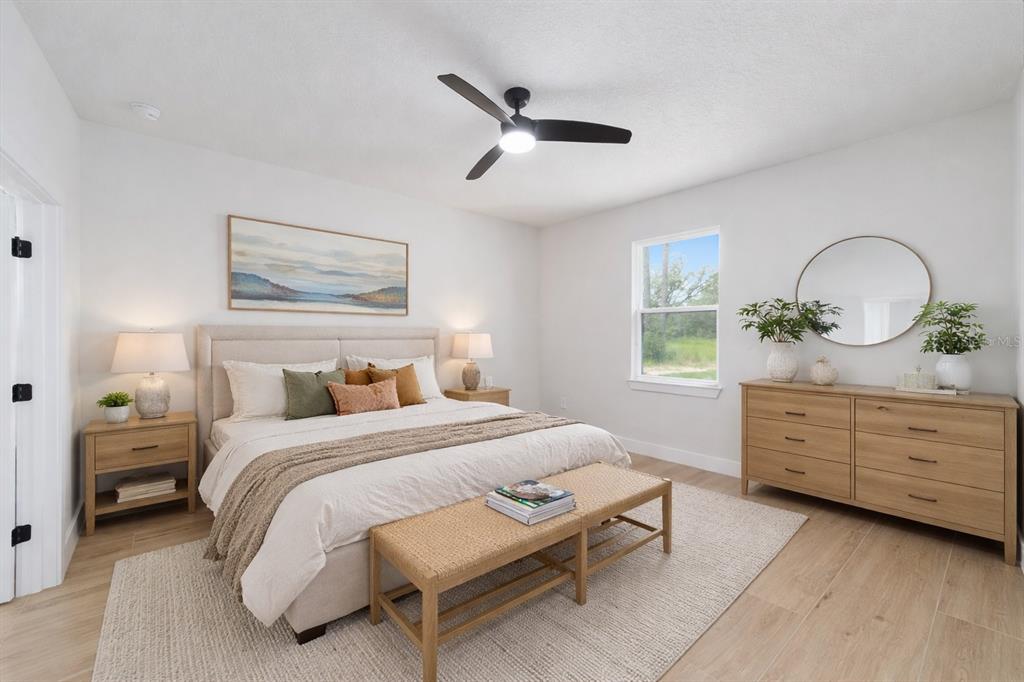 4380 Southwest 159th Court Ocala, FL 34481 - Photo 28 of 44 a bedroom with a bed and a dresser