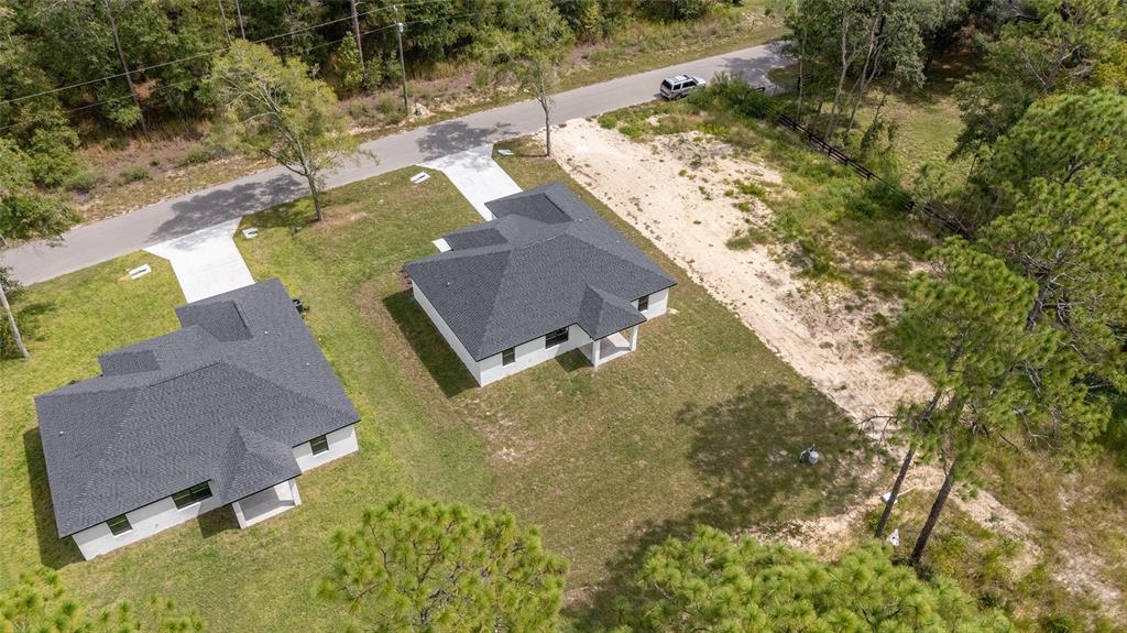 4380 Southwest 159th Court Ocala, FL 34481 - Photo 41 of 44 an aerial view of a house with a yard