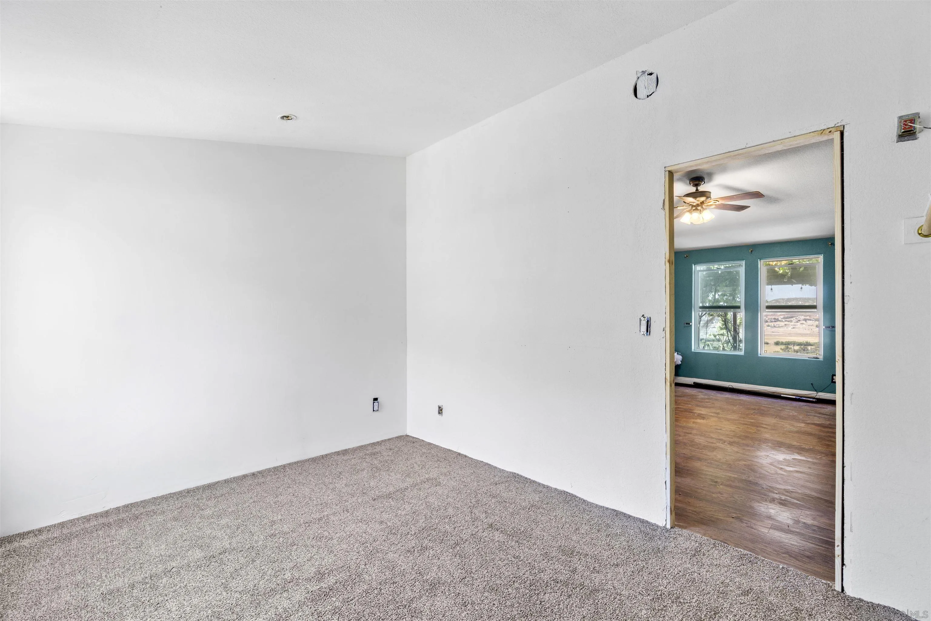 5631 Alpine Boulevard Alpine, CA 91901 - Photo 14 of 20 an empty room with windows