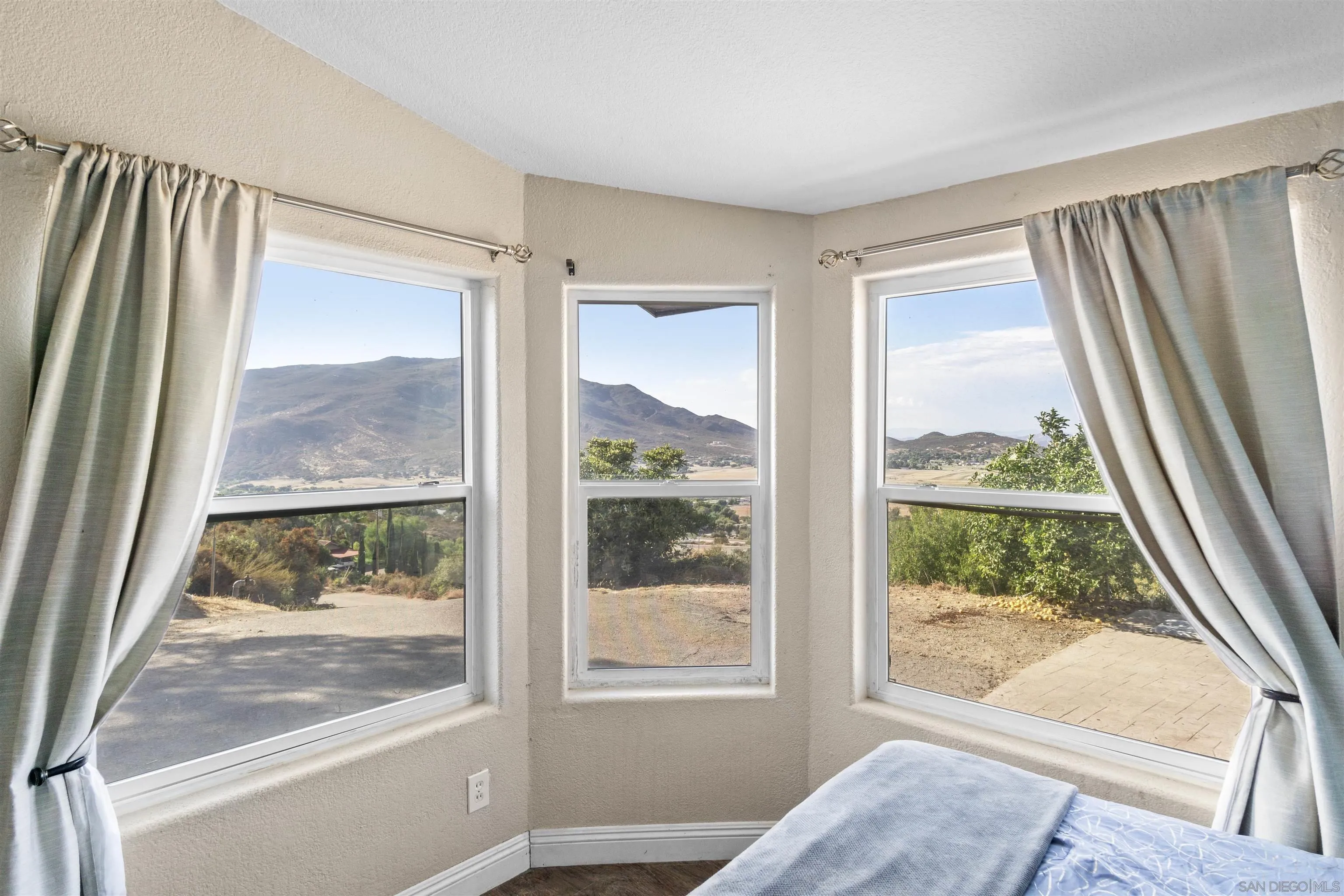 5631 Alpine Boulevard Alpine, CA 91901 - Photo 17 of 20 a view of a room that has a large window and front view