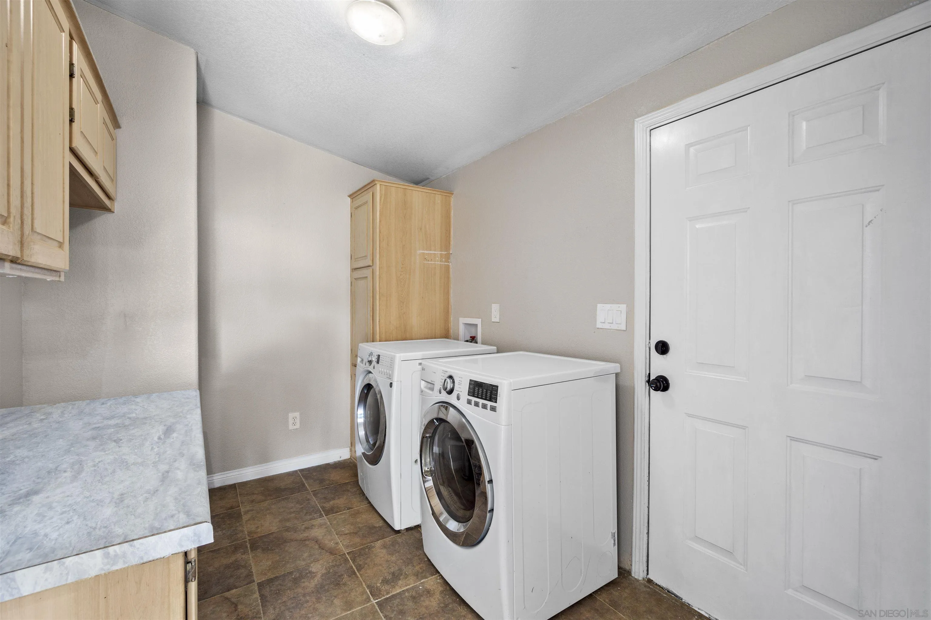 5631 Alpine Boulevard Alpine, CA 91901 - Photo 20 of 20 a utility room with dryer and washer