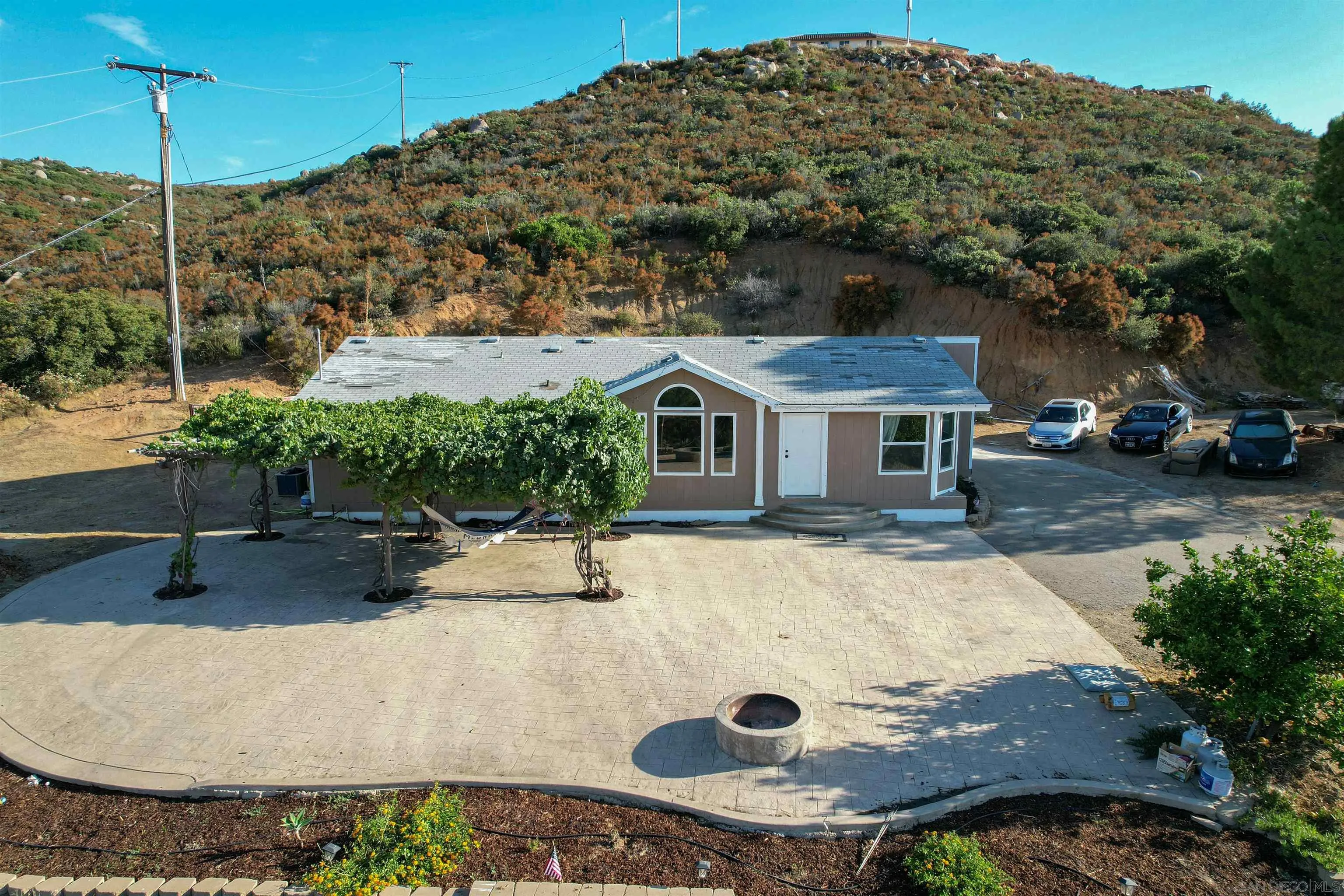 5631 Alpine Boulevard Alpine, CA 91901 - Photo 5 of 20 a swimming pool with outdoor seating and yard