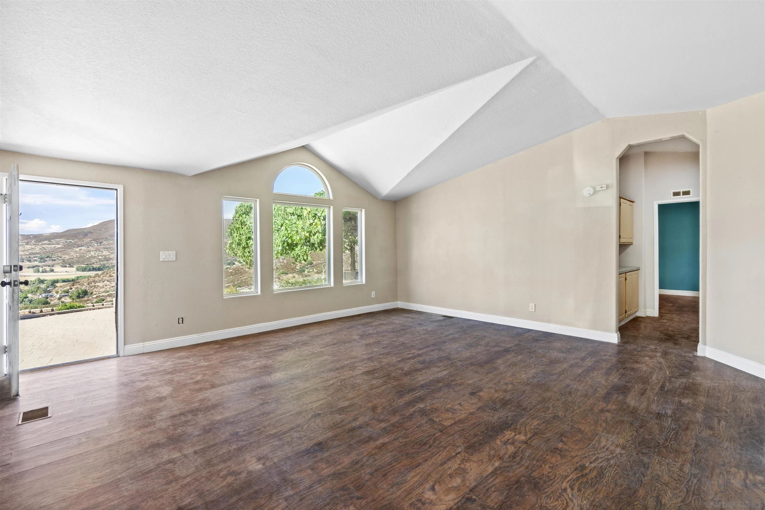5631 Alpine Boulevard Alpine, CA 91901 - Photo 6 of 20 an empty room with windows and view