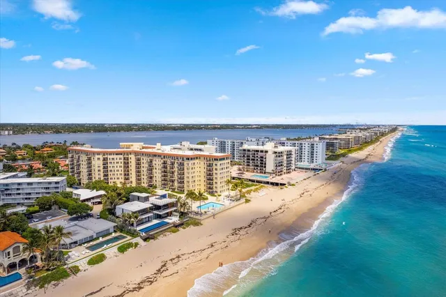 a view of a swimming pool with an ocean view