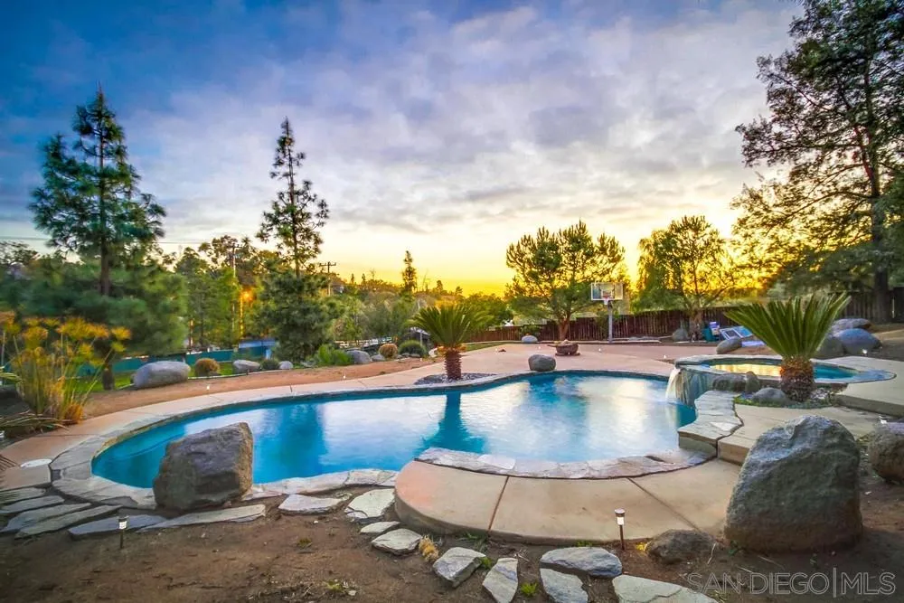 2010 South Grade Road Alpine, CA 91901 - Photo 1 of 35 a view of a swimming pool with a patio