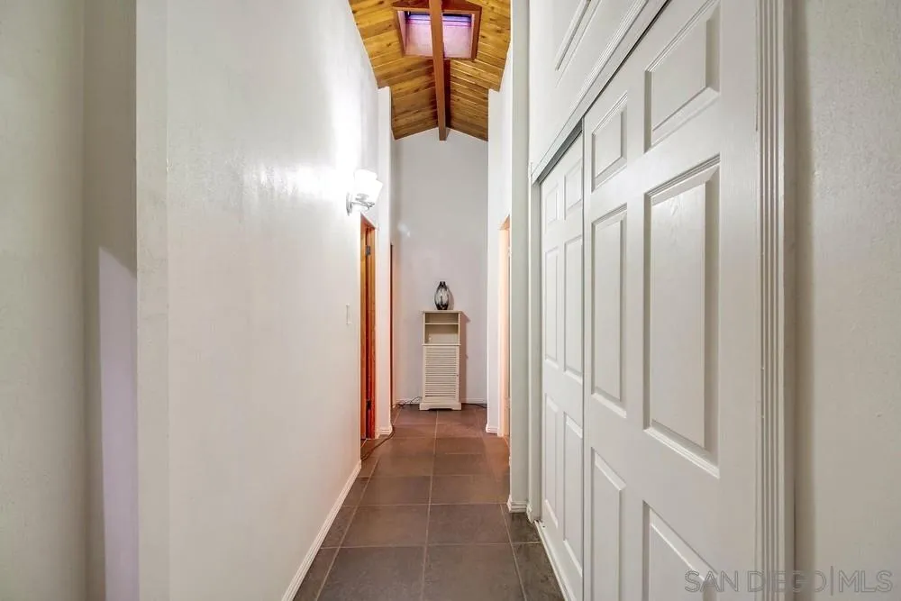 2010 South Grade Road Alpine, CA 91901 - Photo 18 of 35 a view of a hallway with a white door