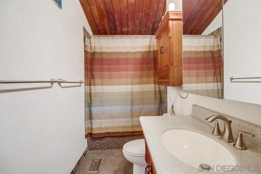 2010 South Grade Road Alpine, CA 91901 - Photo 20 of 35 a bathroom with a sink and a mirror