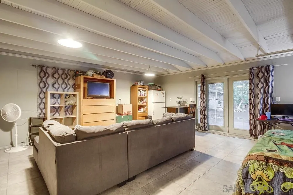 2010 South Grade Road Alpine, CA 91901 - Photo 27 of 35 a living room with furniture and a flat screen tv