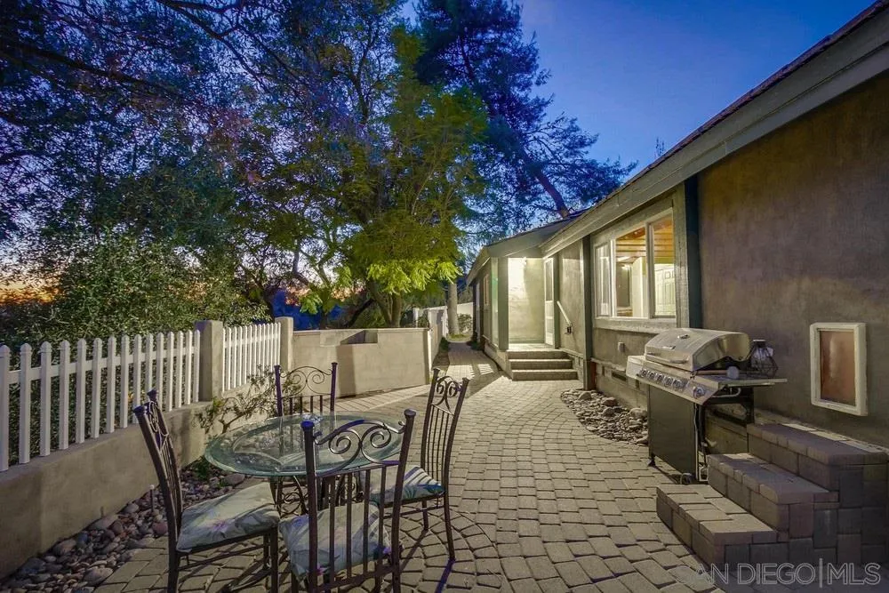 2010 South Grade Road Alpine, CA 91901 - Photo 4 of 35 a view of a patio with table and chairs and potted plants