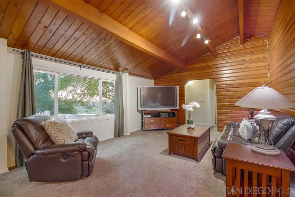 2010 South Grade Road Alpine, CA 91901 - Photo 9 of 35 a living room with furniture and a flat screen tv