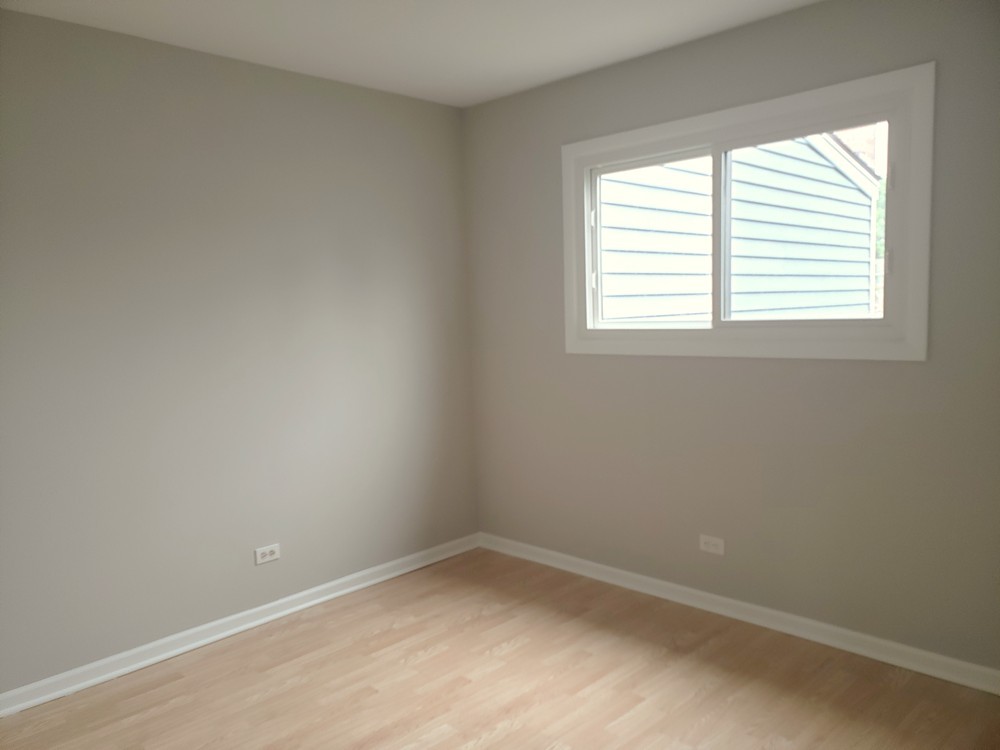 413 Harmony Drive Wheeling, IL 60090 - Photo 12 of 19 an empty room with a window