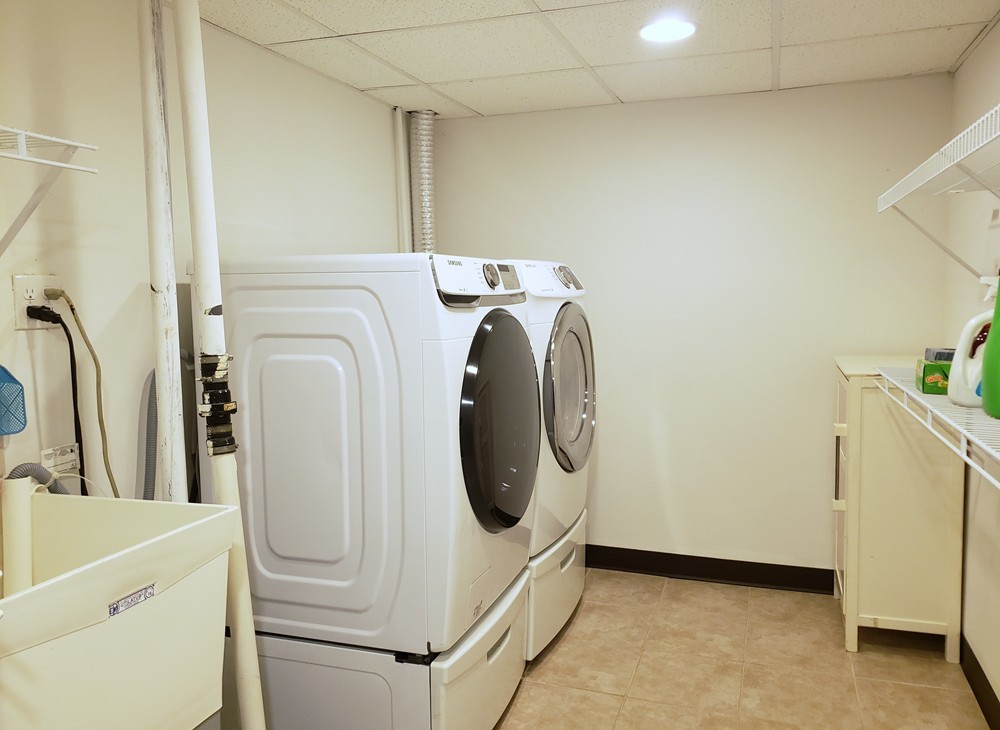 413 Harmony Drive Wheeling, IL 60090 - Photo 17 of 19 a utility room with dryer and washer