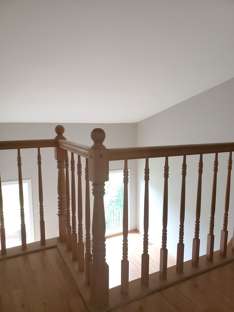 413 Harmony Drive Wheeling, IL 60090 - Photo 8 of 19 a view of staircase with large window