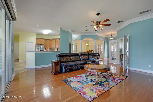 a bedroom with furniture and window