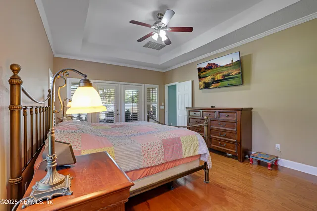 a bathroom with a bathtub and a window