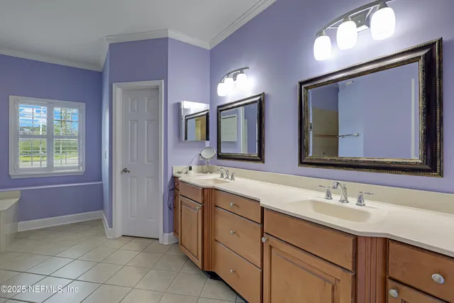 a kitchen with stainless steel appliances granite countertop a stove sink and cabinets