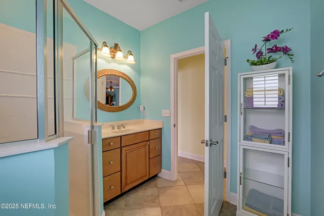 a kitchen with a stove and a refrigerator