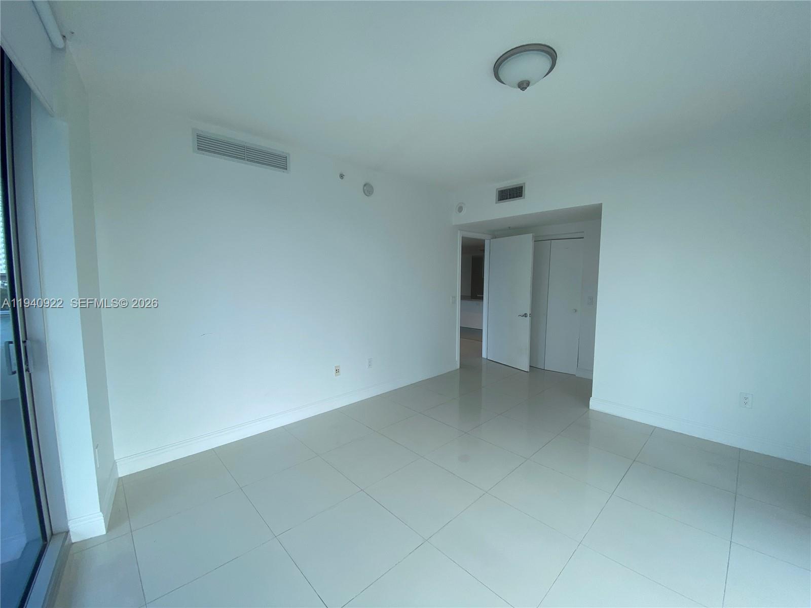 185 Southwest 7th Street, Unit 501 Miami, FL 33130 - Photo 4 of 31 a view of an empty room