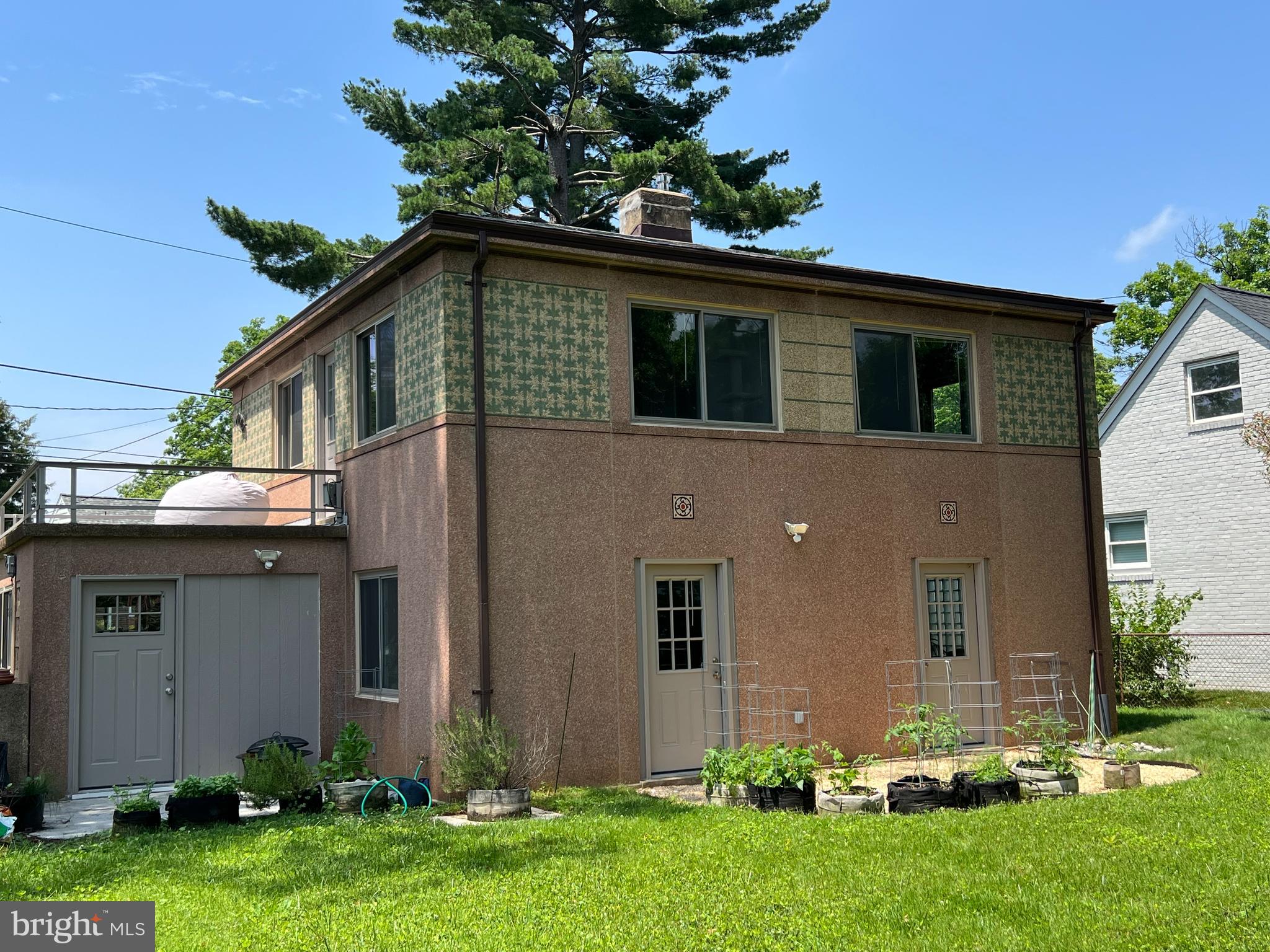 9925 Sutherland Road Silver Spring, MD 20901 - Photo 15 of 15 front view of a house with a yard