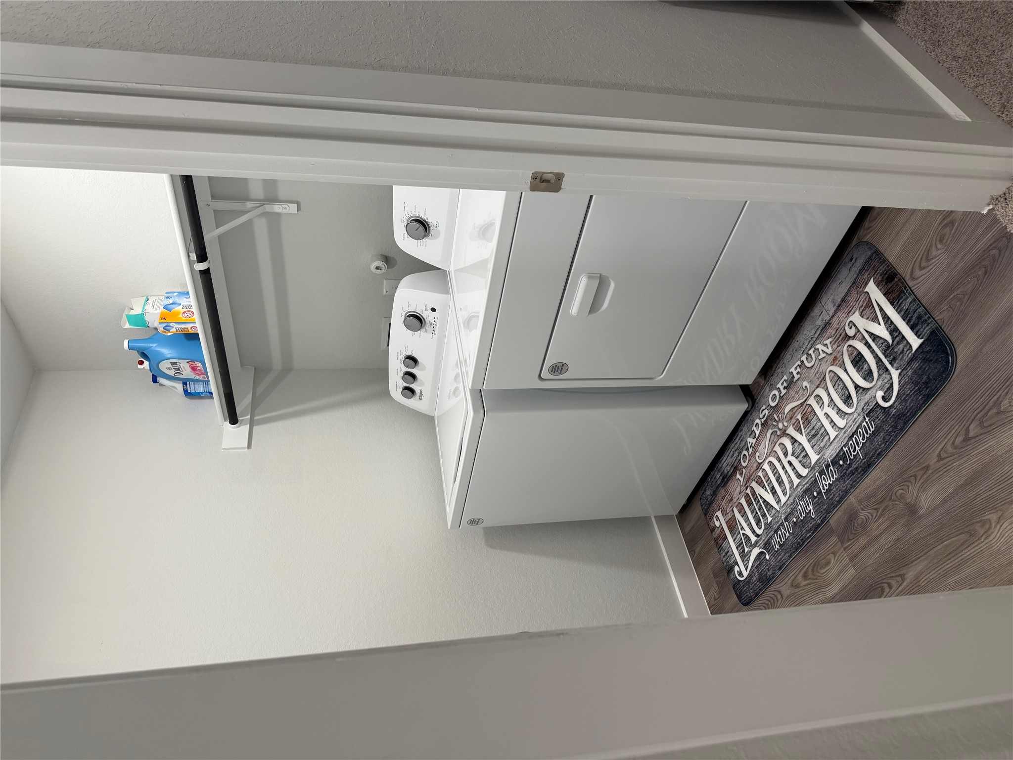 5935 West Hausman Road, Unit 1 San Antonio, TX 78249 - Photo 13 of 14 Washroom with wood finished floors and independent washer and dryer