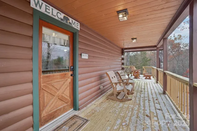 a view of roof deck with patio
