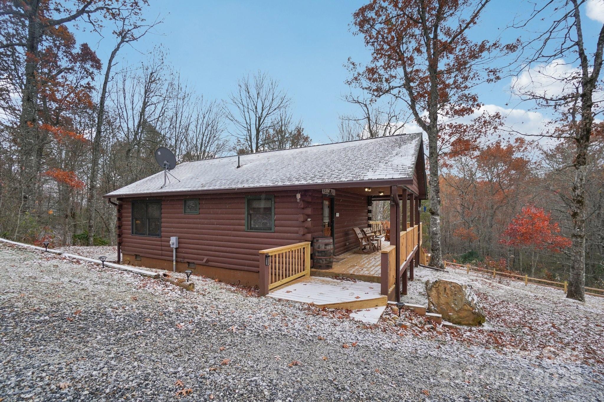 804 Ledbetter Road Robbinsville, NC 28771 - Photo 9 of 27 a view of a house with a yard and large tree
