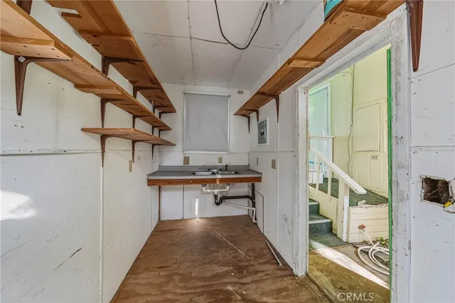 a view of a backyard with sitting area