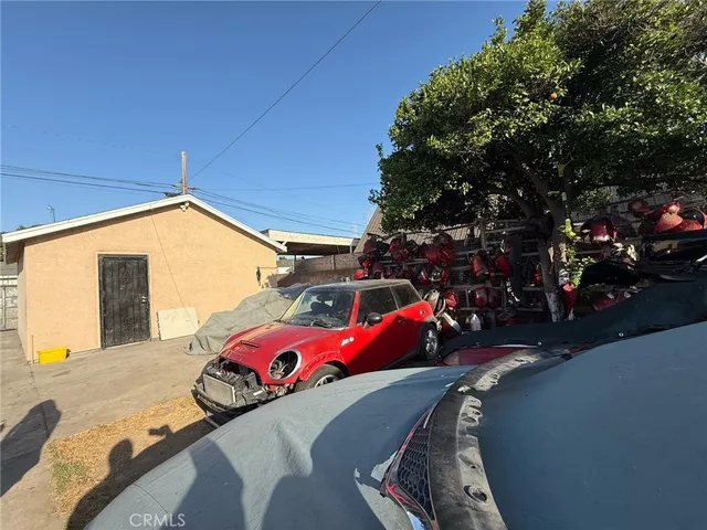 a view of a livingroom with furniture and staircase