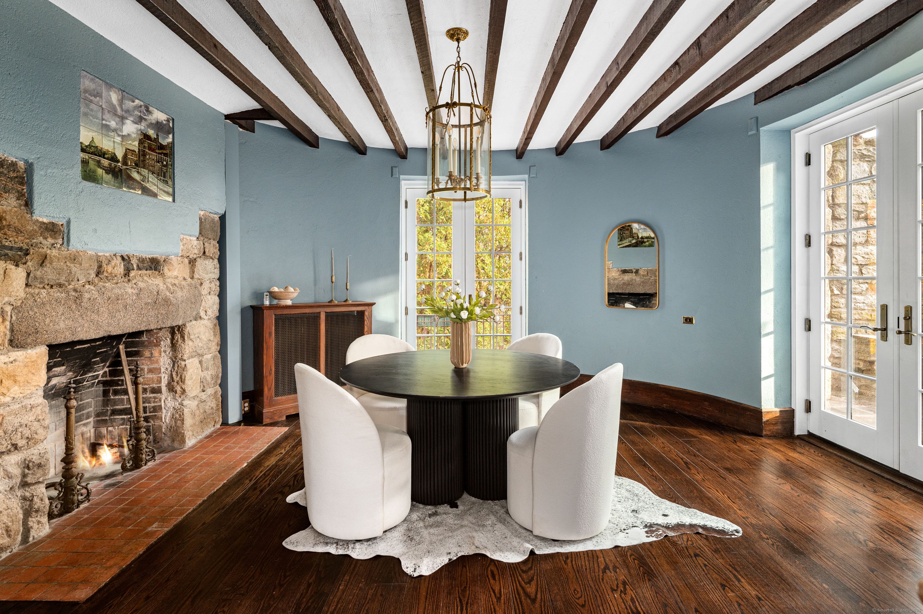 271 Hunting Ridge Road Stamford, CT 06903 - Photo 11 of 40 a dining room with furniture and window