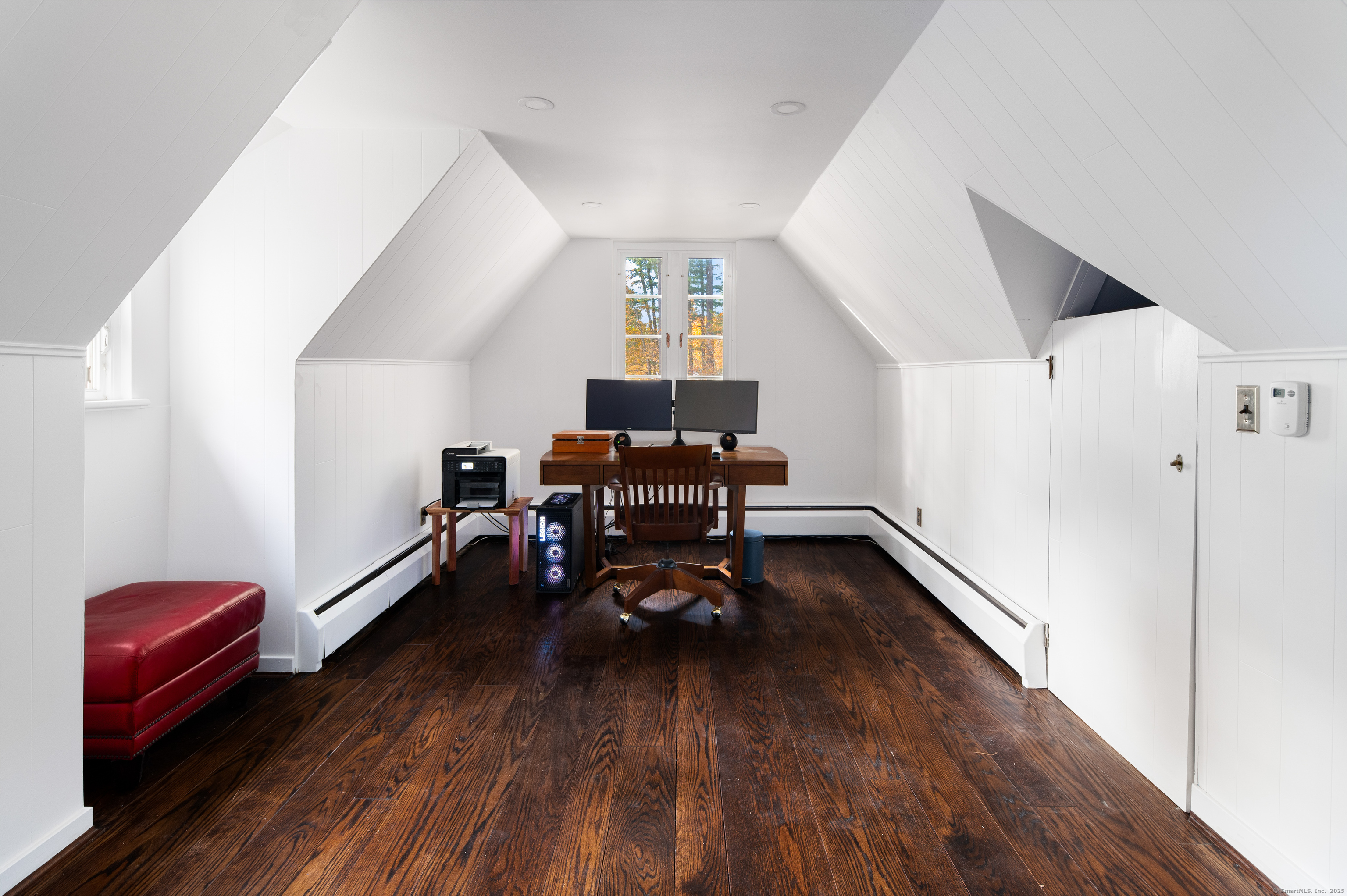 271 Hunting Ridge Road Stamford, CT 06903 - Photo 24 of 40 a living room with furniture and wooden floor