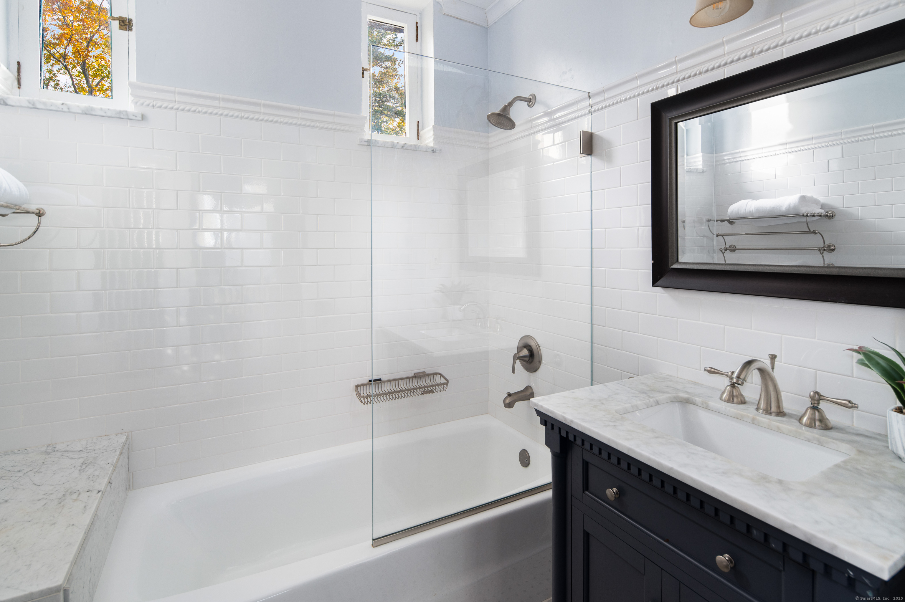 271 Hunting Ridge Road Stamford, CT 06903 - Photo 27 of 40 a bathroom with a sink and a bathtub