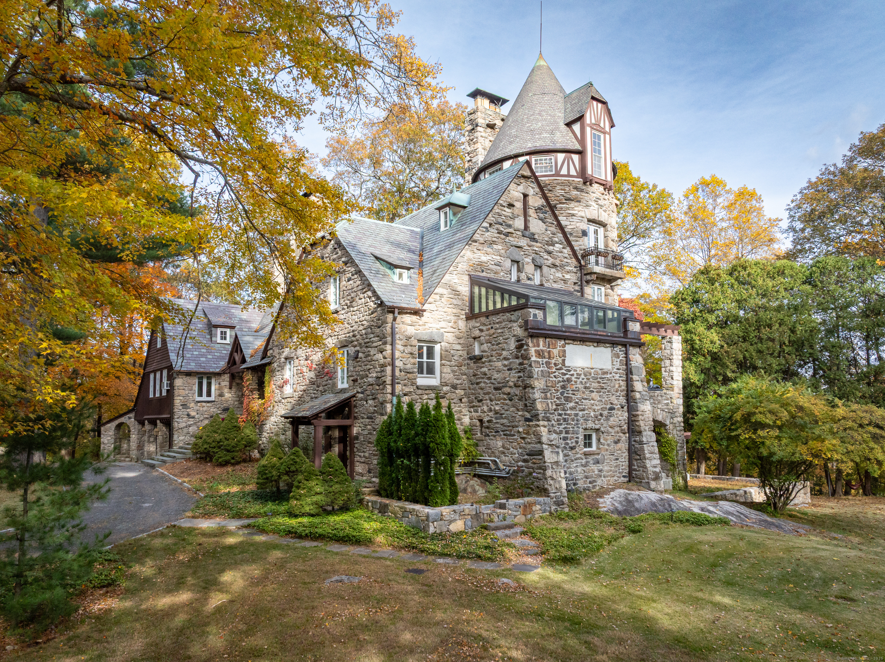 271 Hunting Ridge Road Stamford, CT 06903 - Photo 33 of 40 a view of a building with a yard
