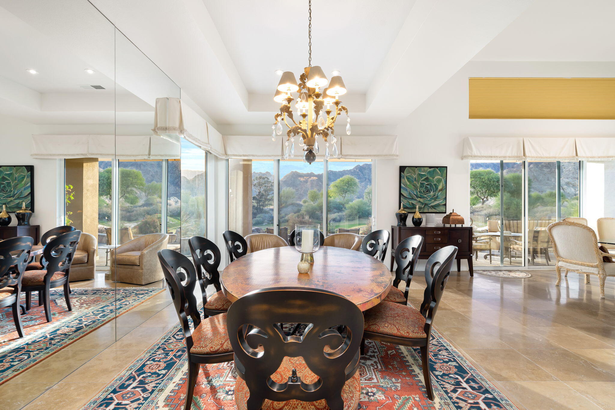 56685 Merion La Quinta, CA 92253 - Photo 29 of 82 a view of a dining room with furniture window and wooden floor