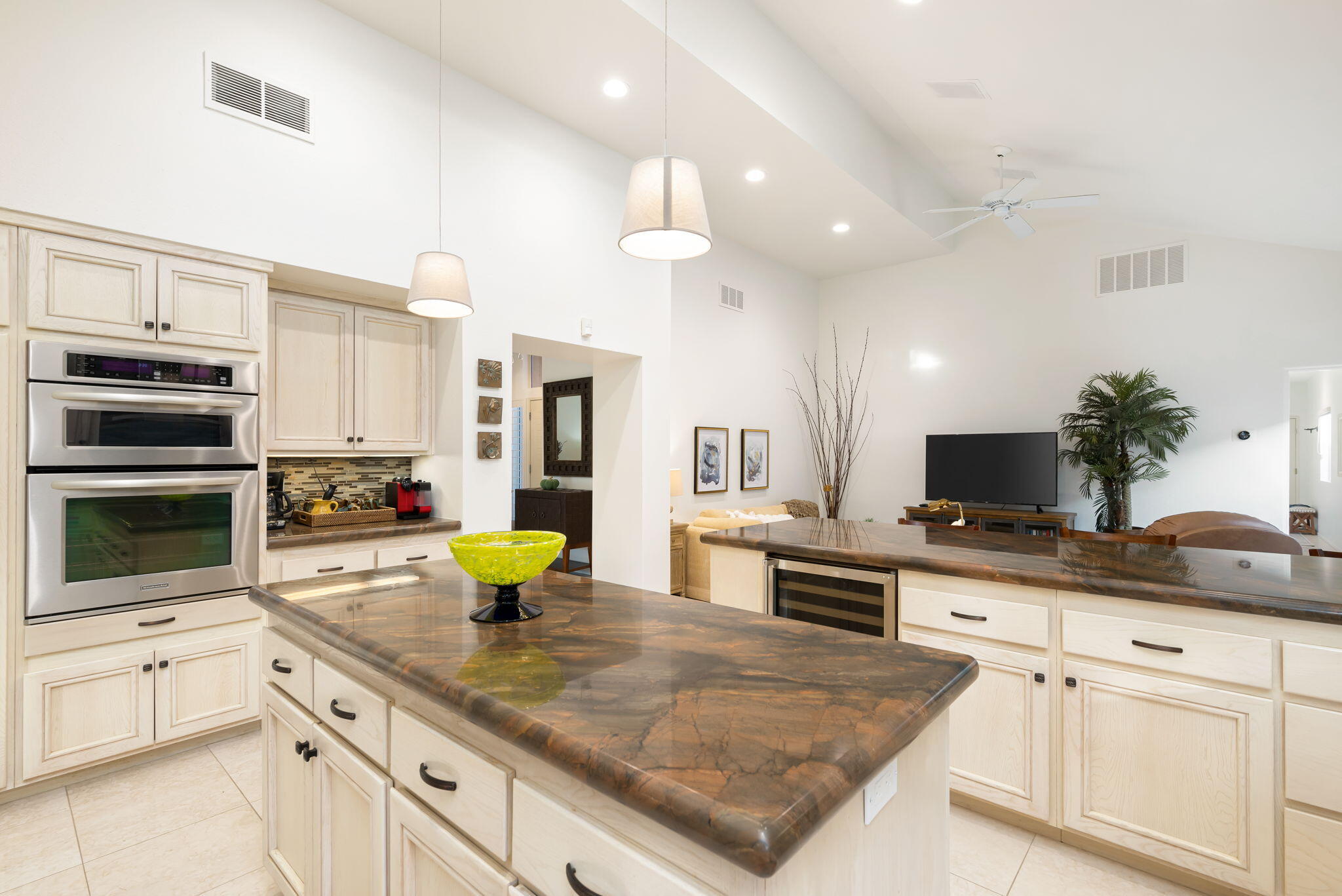 56685 Merion La Quinta, CA 92253 - Photo 34 of 82 a kitchen with a sink counter top space appliances and cabinets