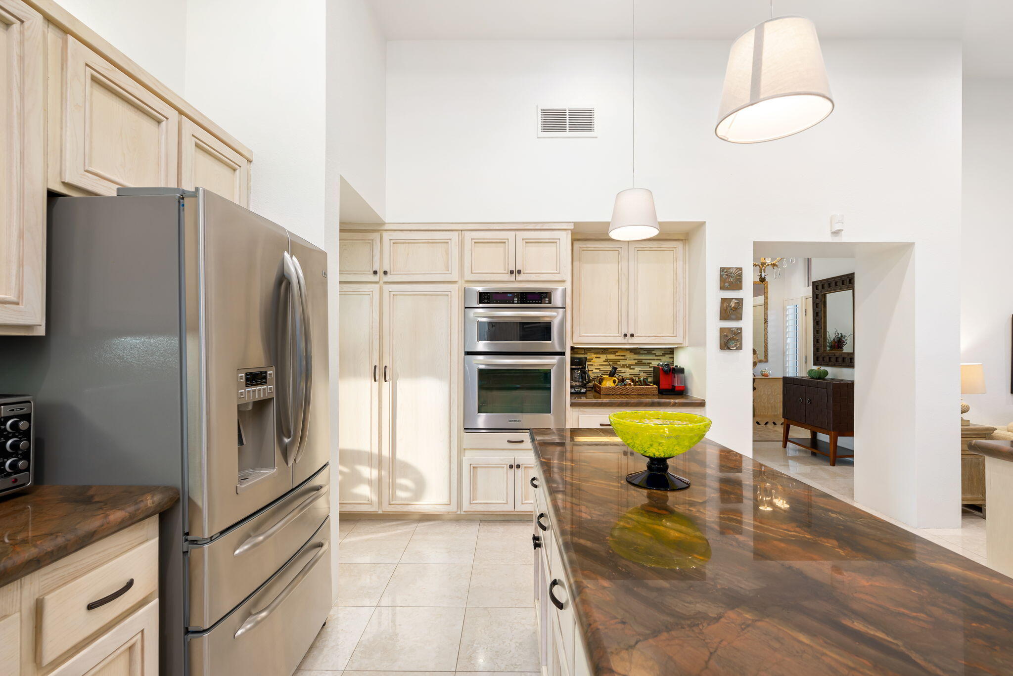 56685 Merion La Quinta, CA 92253 - Photo 35 of 82 a kitchen with stainless steel appliances a refrigerator and a stove
