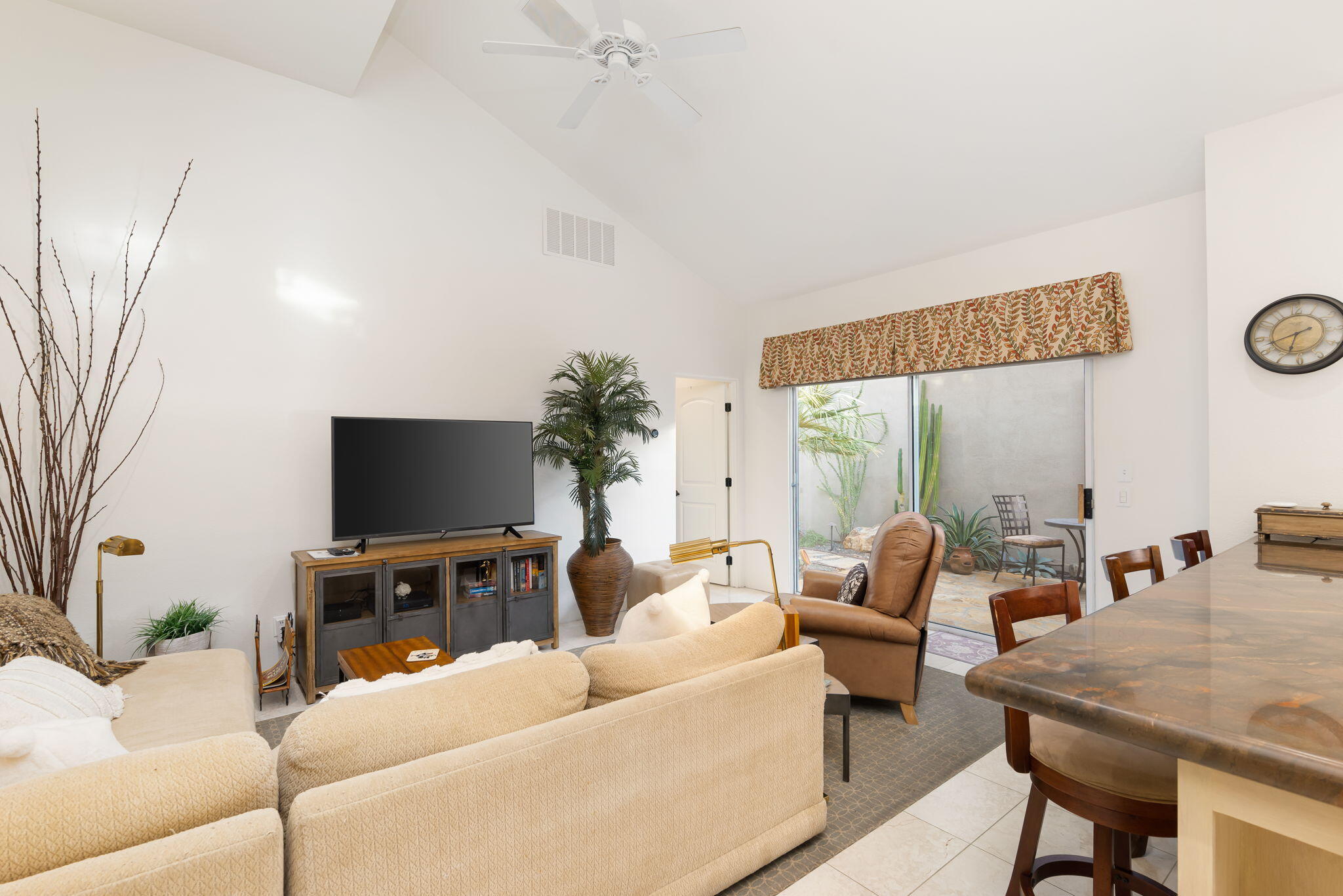 56685 Merion La Quinta, CA 92253 - Photo 37 of 82 a living room with furniture and a flat screen tv