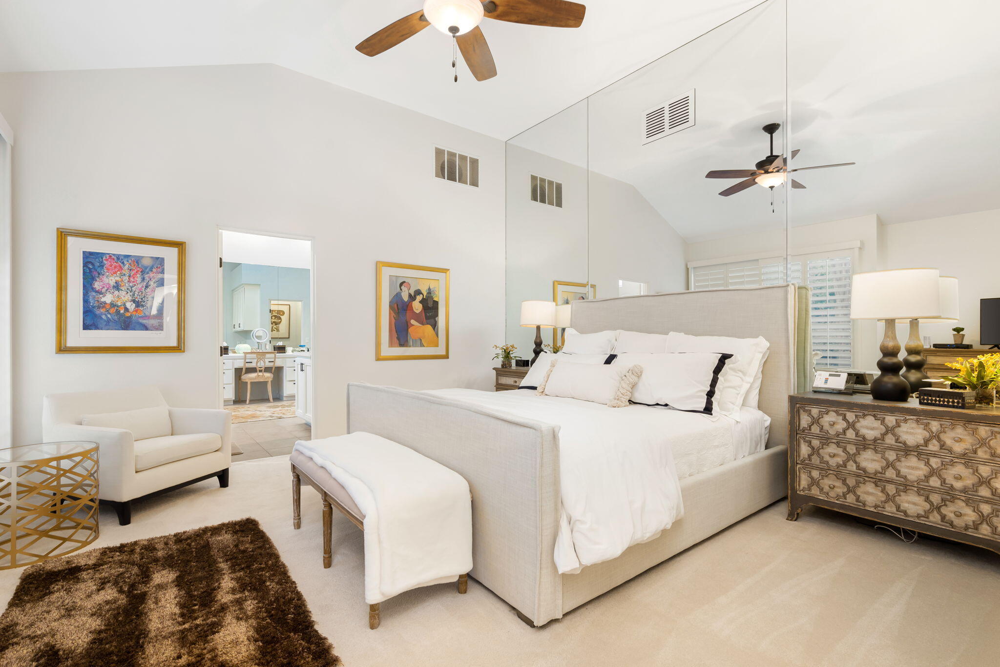 56685 Merion La Quinta, CA 92253 - Photo 40 of 82 a bedroom with bed and a chandelier