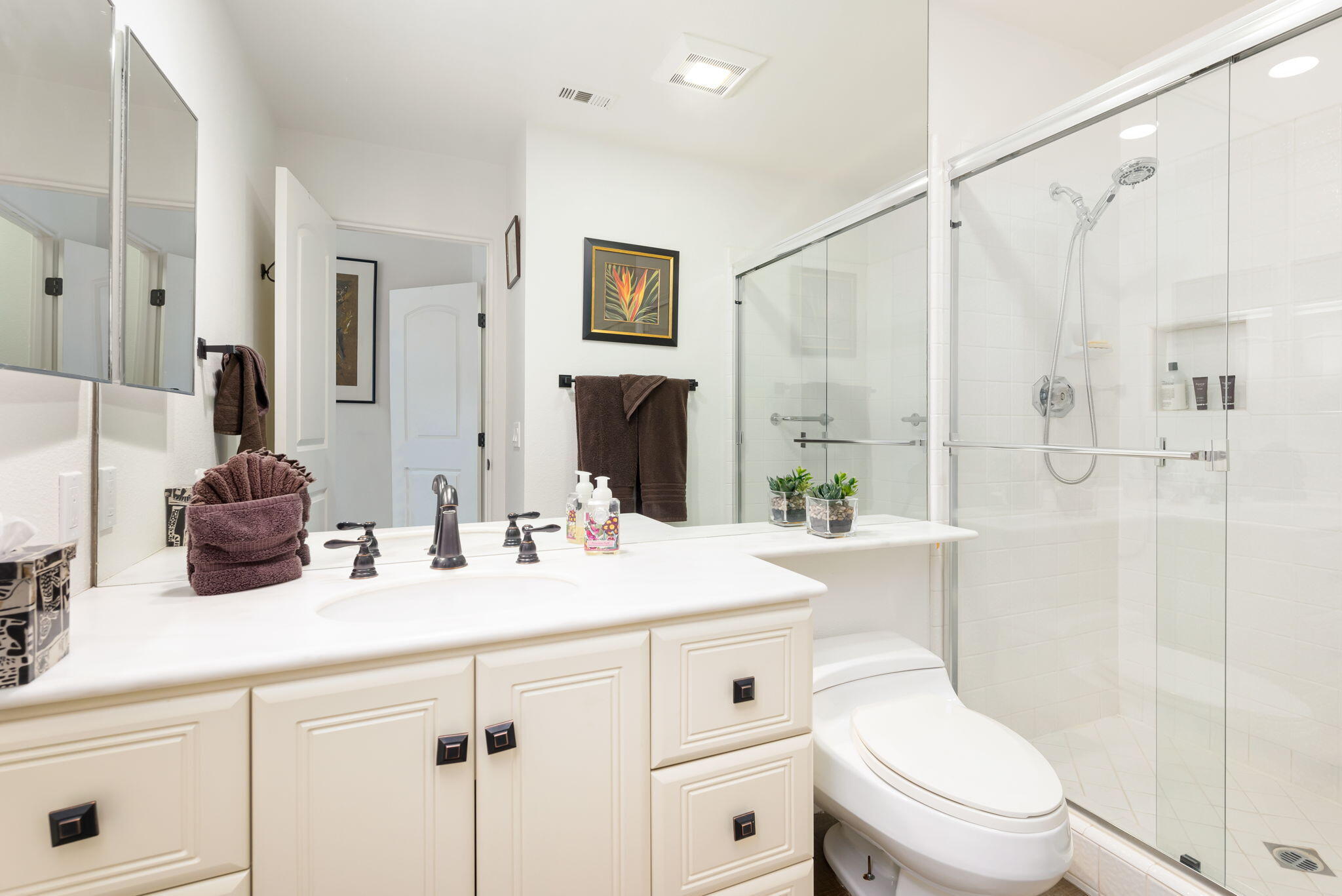 56685 Merion La Quinta, CA 92253 - Photo 46 of 82 a bathroom with a sink a toilet and shower