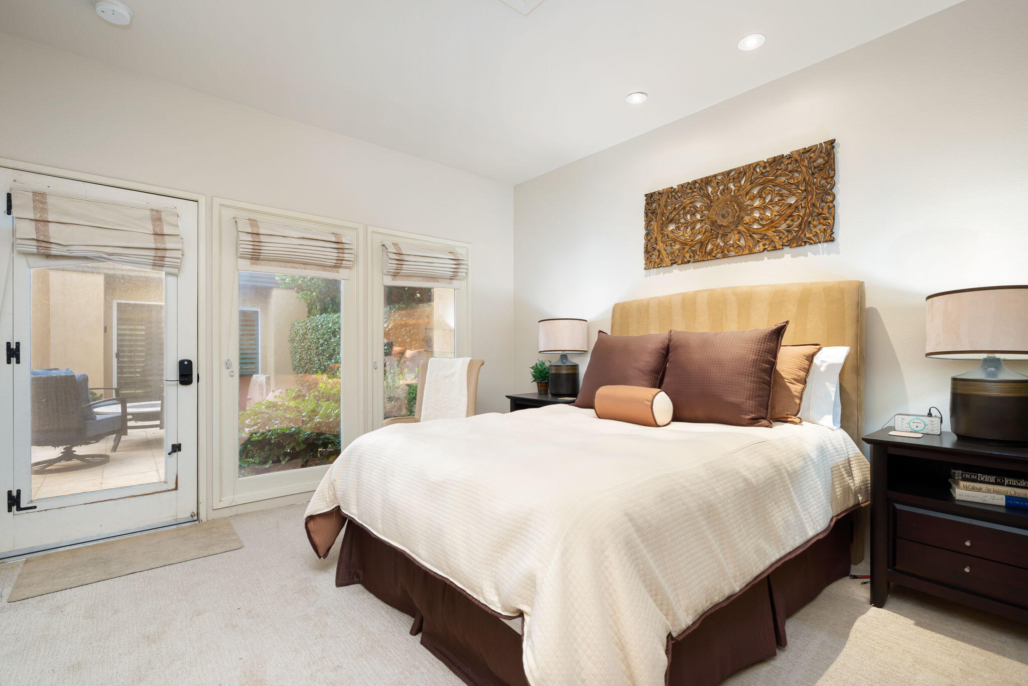 56685 Merion La Quinta, CA 92253 - Photo 51 of 82 a bedroom with a large bed and a large window